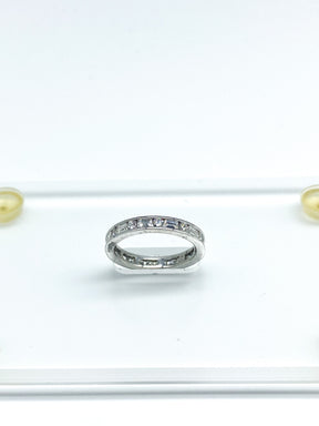 .60 Point Round Brilliant Cut and .60 Point Baguette Diamond Ring