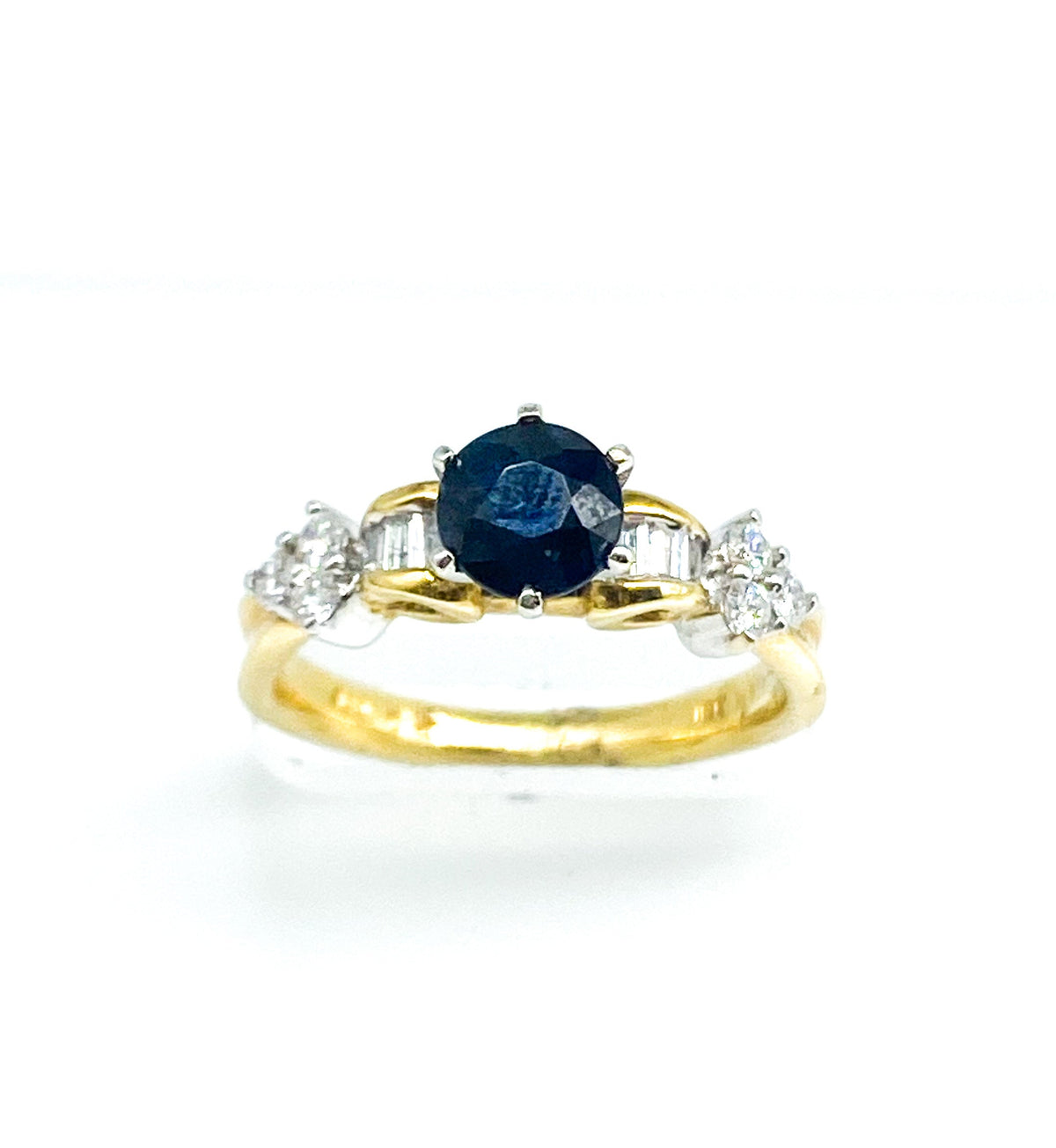.90 Point Blue Sapphire Round Brilliant and .50 Point Baguette Round Brilliant Cut Diamond Ring