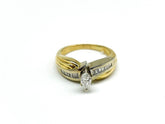 .20 Point Oval Cut and .40 Point Baguette Cut Diamond Ring