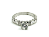 .62 Point Round Brilliant Cut and .40 Point Round Brilliant,Baguette Cut Diamond Ring