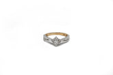 .30 point Marquise Cut and .24 point Tapered Baguettes Cut Diamond Ring