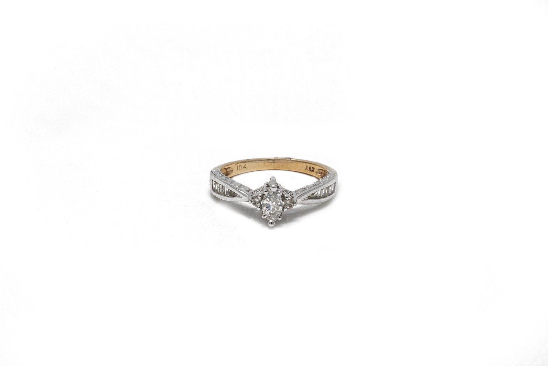 .30 point Marquise Cut and .24 point Tapered Baguettes Cut Diamond Ring