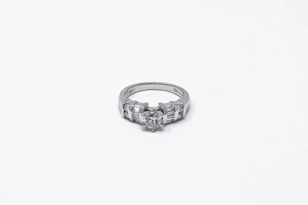 .66 point and .56 point Round Brilliant Cut Diamond Ring