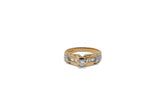 .20 point Round Brilliant Cut and .20 Baguette Cut Diamond Ring