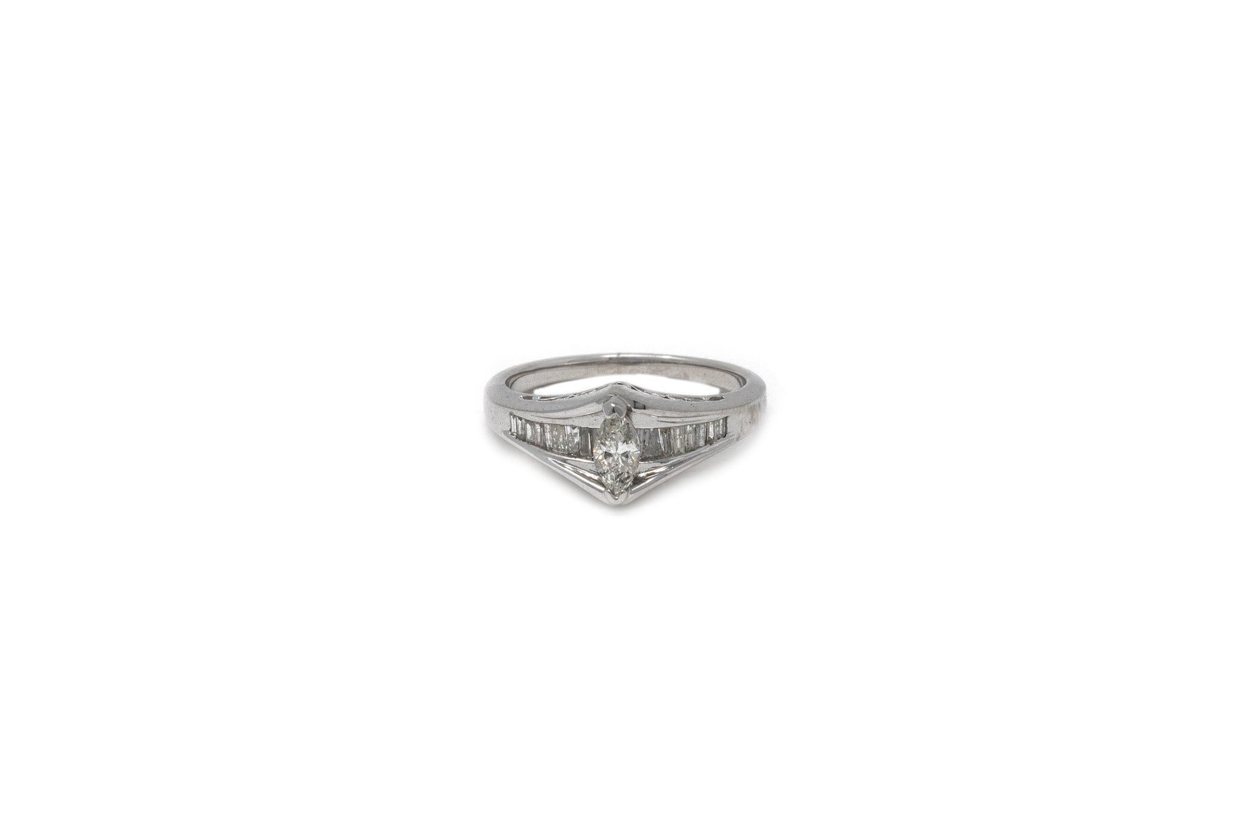 .28 point Marquise Cut and .40 point Tapered Baguette Diamond Ring
