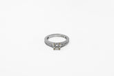 .95 point Round Brilliant Cut and .93 point Baguette and Round Brilliant Cut Diamond Ring
