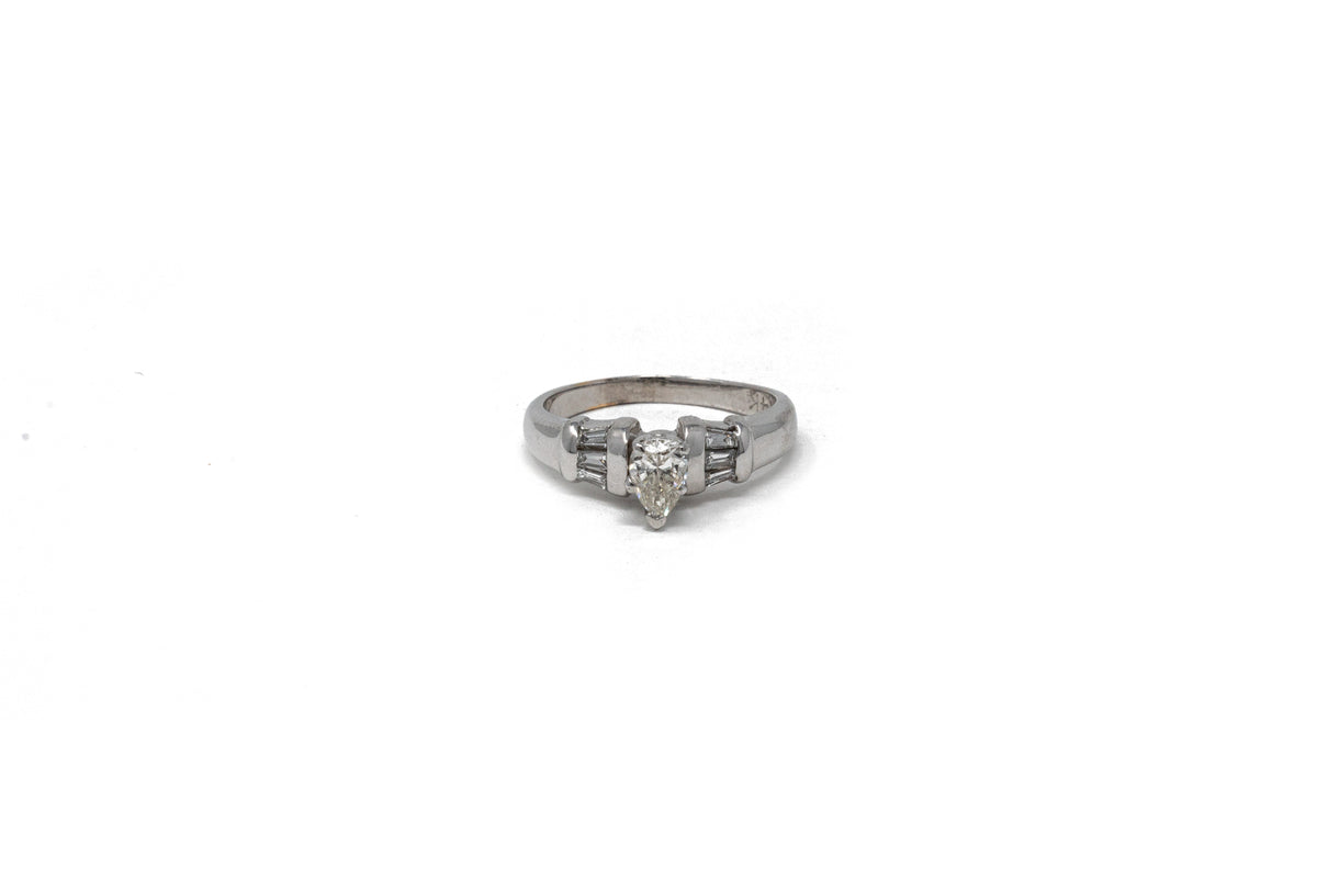 .35 point Pear Cut and .25 Baguette Cut Diamond Ring